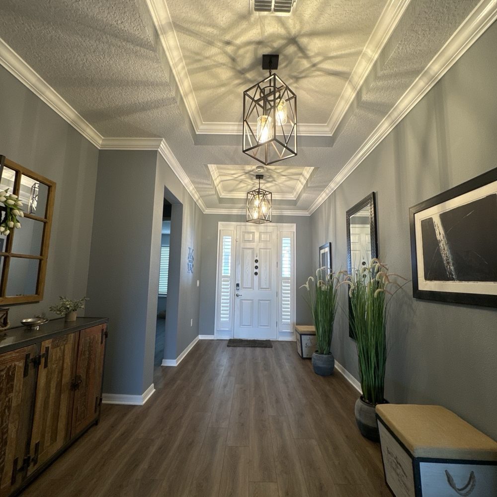 Refreshed hallway with tray ceiling and crisp trim